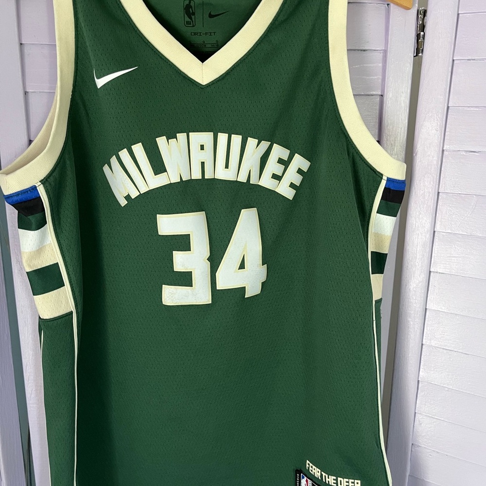 MILWAUKEE BUCKS “ Fear the Deer”NBA Green Dri-Fit Jersey.  Older boys size L